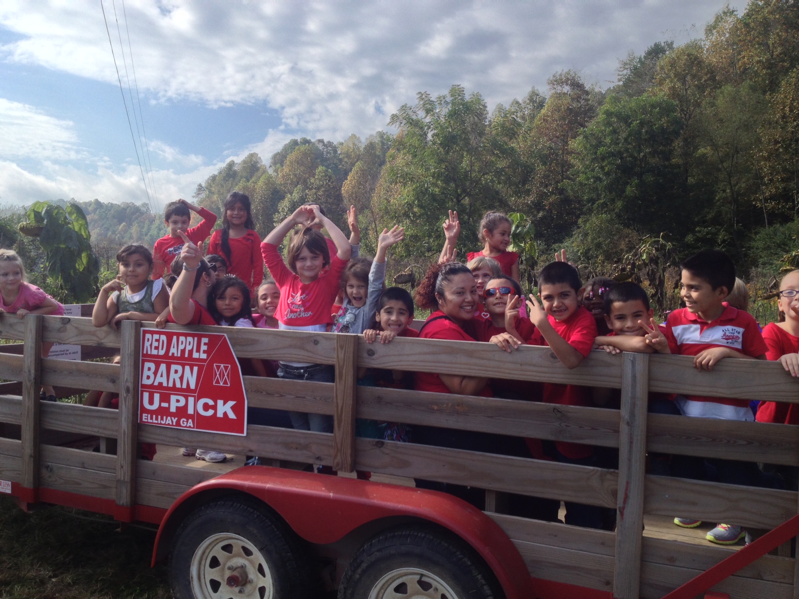 A school field trip from Dalton, Ga taking the wagon ride for some Apple Picking